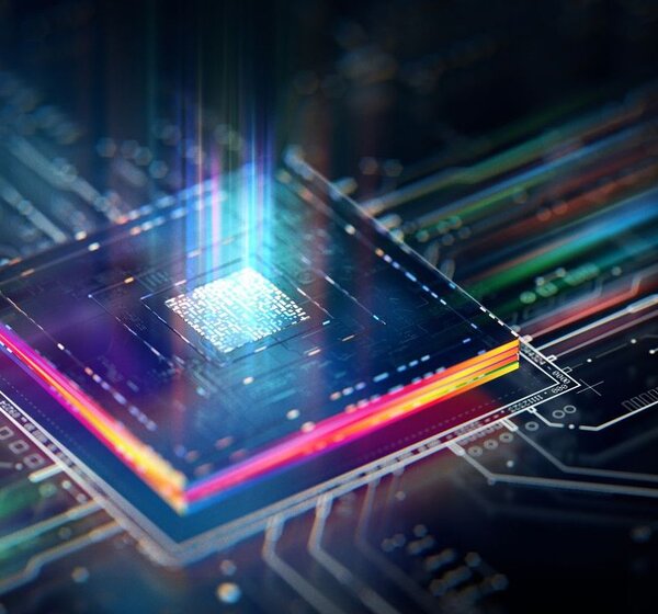 Image showing a concept of a futuristic processor unit.An extreme closeup of an artist’s concept of a futuristic processor unit. The unit is set in a motherboard with glowing data transferring from its centre outwards. 