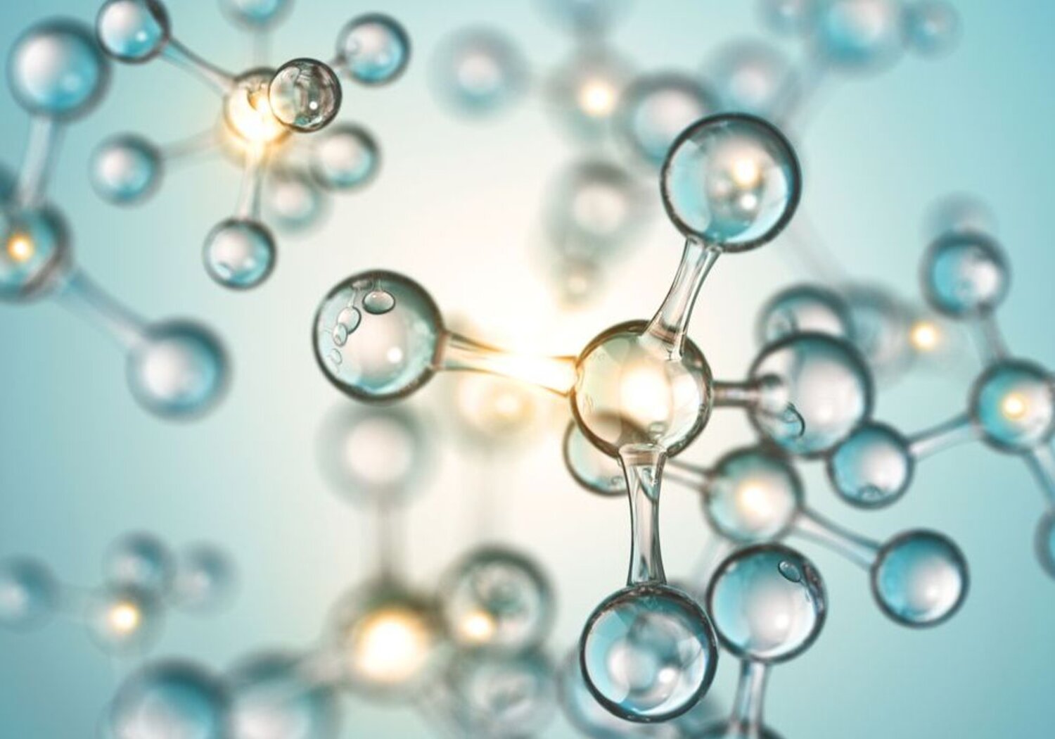 Image showing a 3D rendering of molecules in suspension.A close up of a 3D illustration of molecules in suspension. Against a light blue background float molecules, each composed of a central atom surrounded by four other atoms.