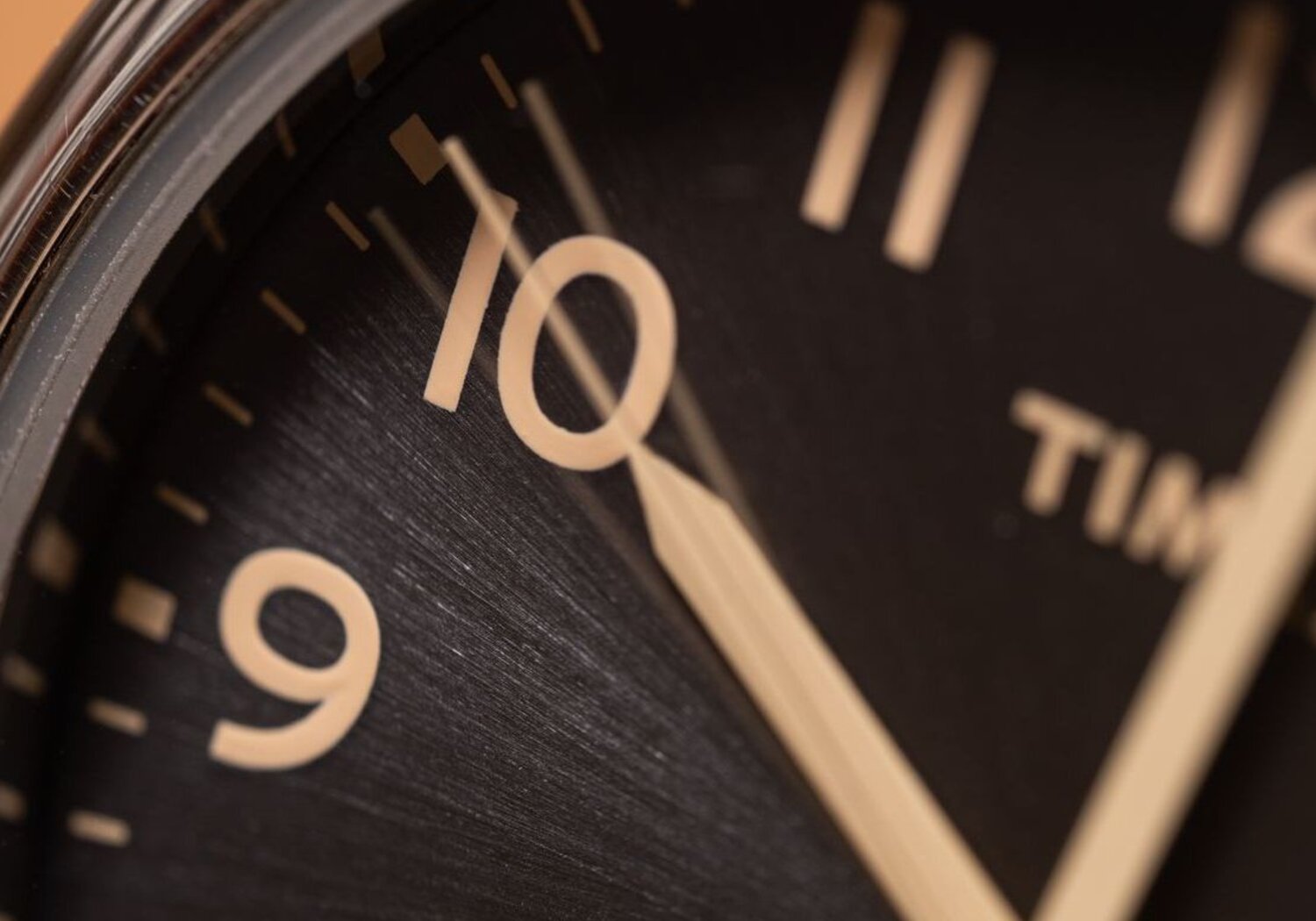 Image showing a close up of a watch pointer.Extreme close up of the pointers of a watch with the shorthand at 10 and the longhand at 12.
