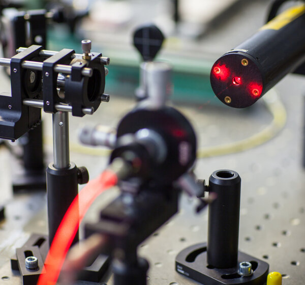 Image of a Laser on bench in quantum laboratory