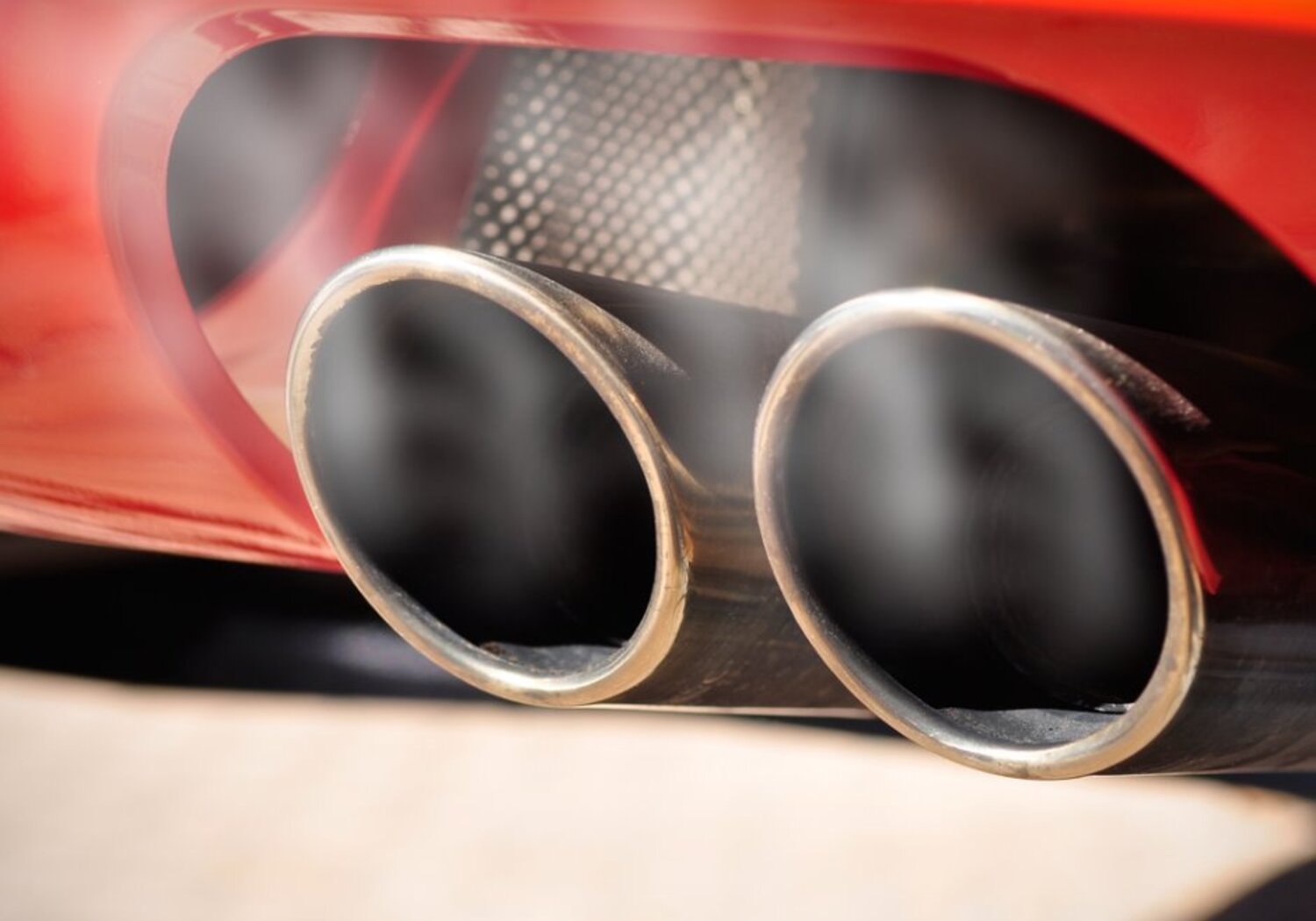 Image showing a Car dual exhaust pipe with smoke 