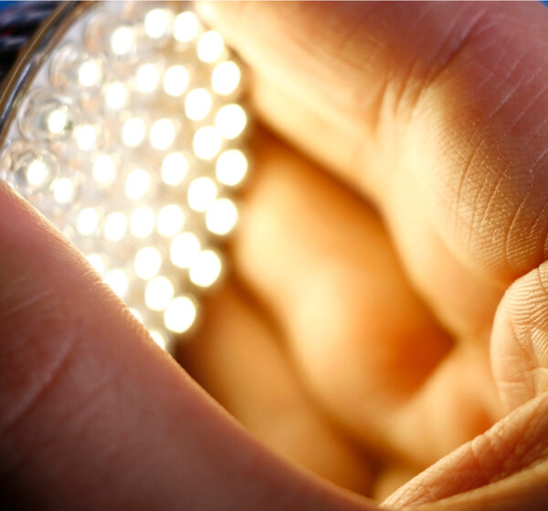 Image showing a white LED in a hand