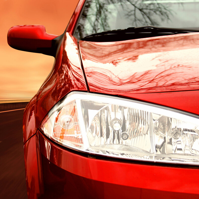 Developing a metrological format for visual attributes Image showing the right side of a red sportscar on a highway