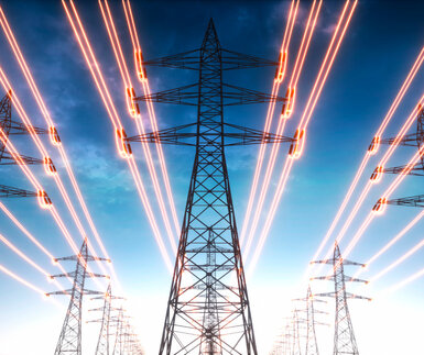 Image showing electricity transmission towers with red glowing wires